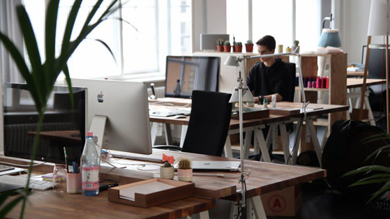 Man at desk in a coworking space