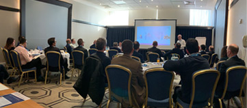 Attendees listening to Andy Jones talk